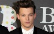 Louis Tomlinson 1D Bangun 'Panic Room' untuk Hindari Penguntit